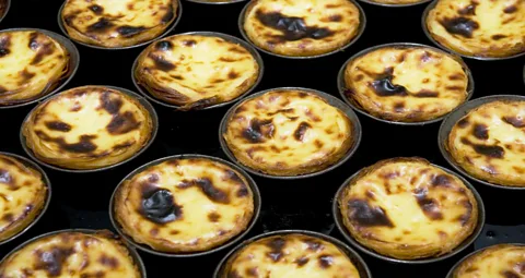 Pastel de nata are the ultimate accompaniment to a tiny but mighty cup of Portuguese coffee. (Paul Bernhardt/LPI)