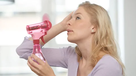 Alamy Sweltering. Would somebody please just open a window! (Credit: Alamy)