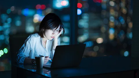 Getty Images Japan's work culture is known for being so punishing that the word karoshi, or dying from overwork, has entered the lexicon (Credit: Getty Images)
