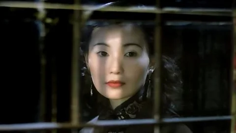 Alamy Maggie Cheung played Ruan Lingyu in Stanley Kwan’s Centre Stage, which mixes reenactments of moments from Ruan’s life with archive footage (Credit: Alamy)