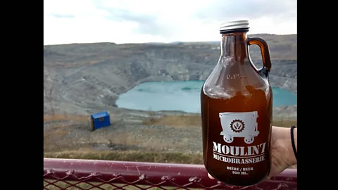 Lorcan Archer One of the beers produced by the Moulin 7 Microbrewery uses water that has accumulated at the bottom of the open cast asbestos mine (Credit: Lorcan Archer)