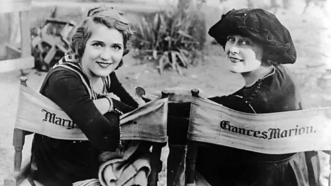 Getty Images Pickford and director Frances Marion with personalised canvas chairs on the set of the 1921 United Artists war drama Straight is the Way (Credit: Getty Images)