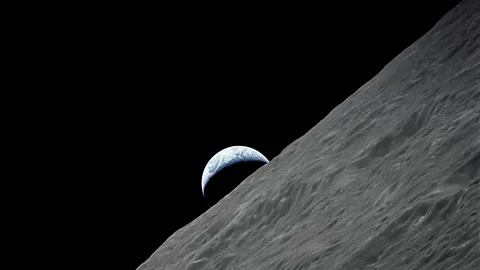 Nasa Earth behind Moon (Credit: Nasa)