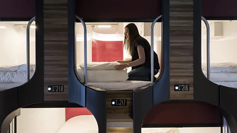 Getty Images Today, many of the cheaper, themed hotels aimed at young people and budget travellers take heavy design influence from Japan's capsule hotels (Credit: Getty Images)