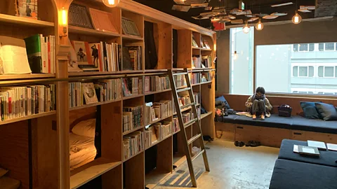 Bryan Lufkin At Book and Bed Tokyo, guests can stay overnight or just pay for a couple of hours to read and mingle with others (Credit: Bryan Lufkin)