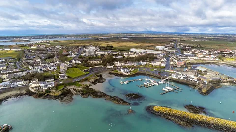 Shawn Williams/Getty Images The seven-mile pilgrimage ends at the charming medieval port of Ardglass (Credit: Shawn Williams/Getty Images)