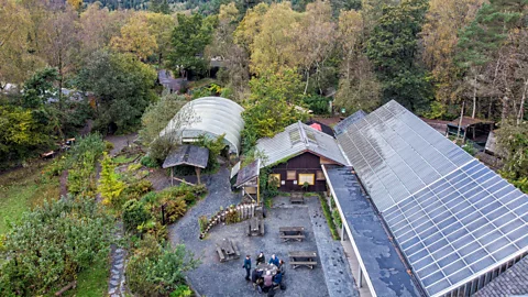 Centre for Alternative Technology CAT is a seemingly ramshackle collection of log cabins, old wind turbines, thatched huts, steel tubes and funicular railways (Credit: Centre for Alternative Technology)