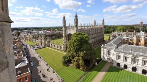 Jeff Overs/BBC The outside of a Cambridge University building.