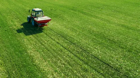 Getty Images field being fertilised